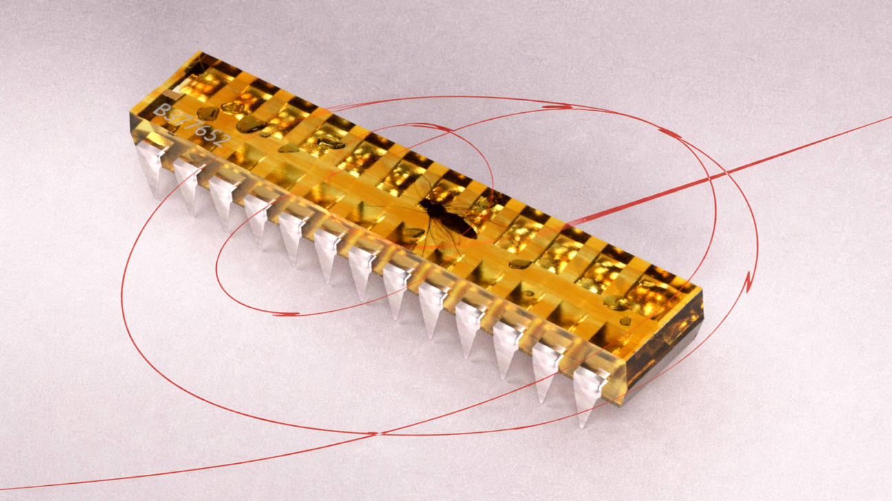 Caurspīdīga elektroniska komponente ar dzintara krāsas virsmu un sudrabainām kājiņām, kurā iesprostots ods. Uz komponentes redzams uzraksts "B37652". Ap komponenti un pāri attēlam vijas sarkanas, plānas līnijas, veidojot apļus un taisnus posmus.